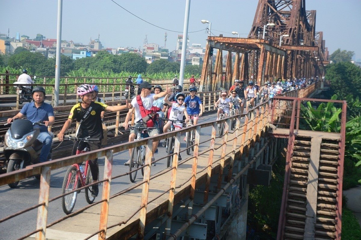 The Pulse of Hanoi: A Comprehensive Guide to a Long Bien Bridge Cycling Tour